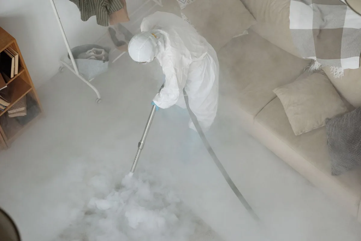 Biohazard cleanup technician in protective equipment, Florham Park, NJ